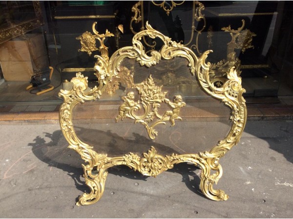 Pare feu ancien de style Louis XV à riche décoration