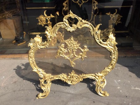 Pare feu ancien de style Louis XV à riche décoration